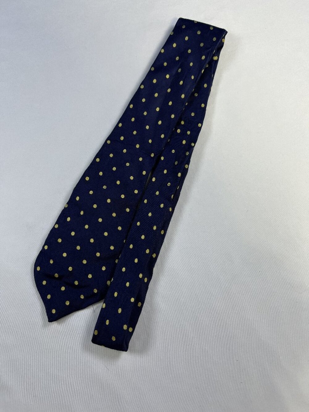 A classic men's necktie by the brand IZOD